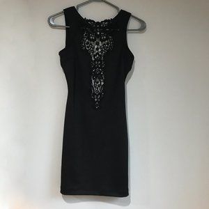 Black bodycon dress with open back